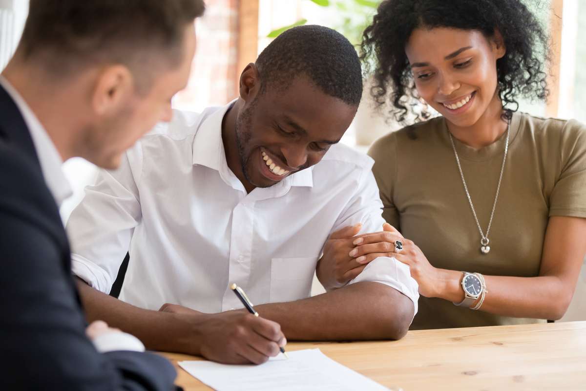 Happy african black family couple customers renters (R) (S)