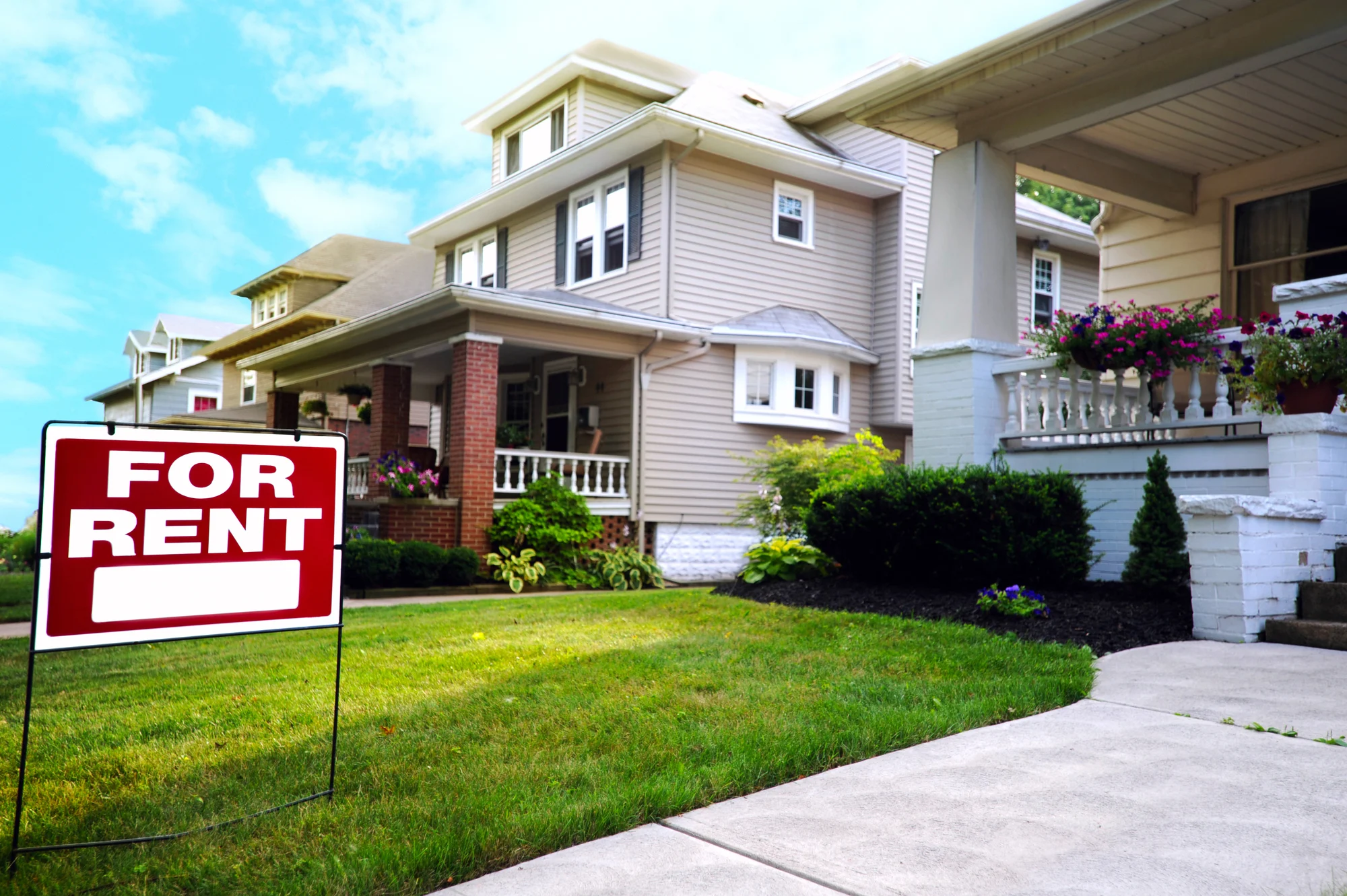 Home For Rent Sign in Front of Beautiful American House