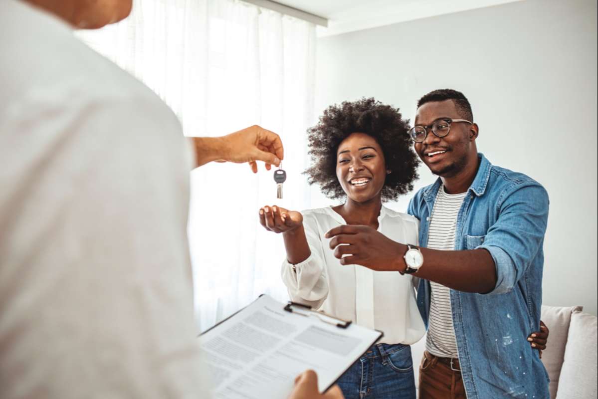 Homeowners receiving their new house keys (R) (S)