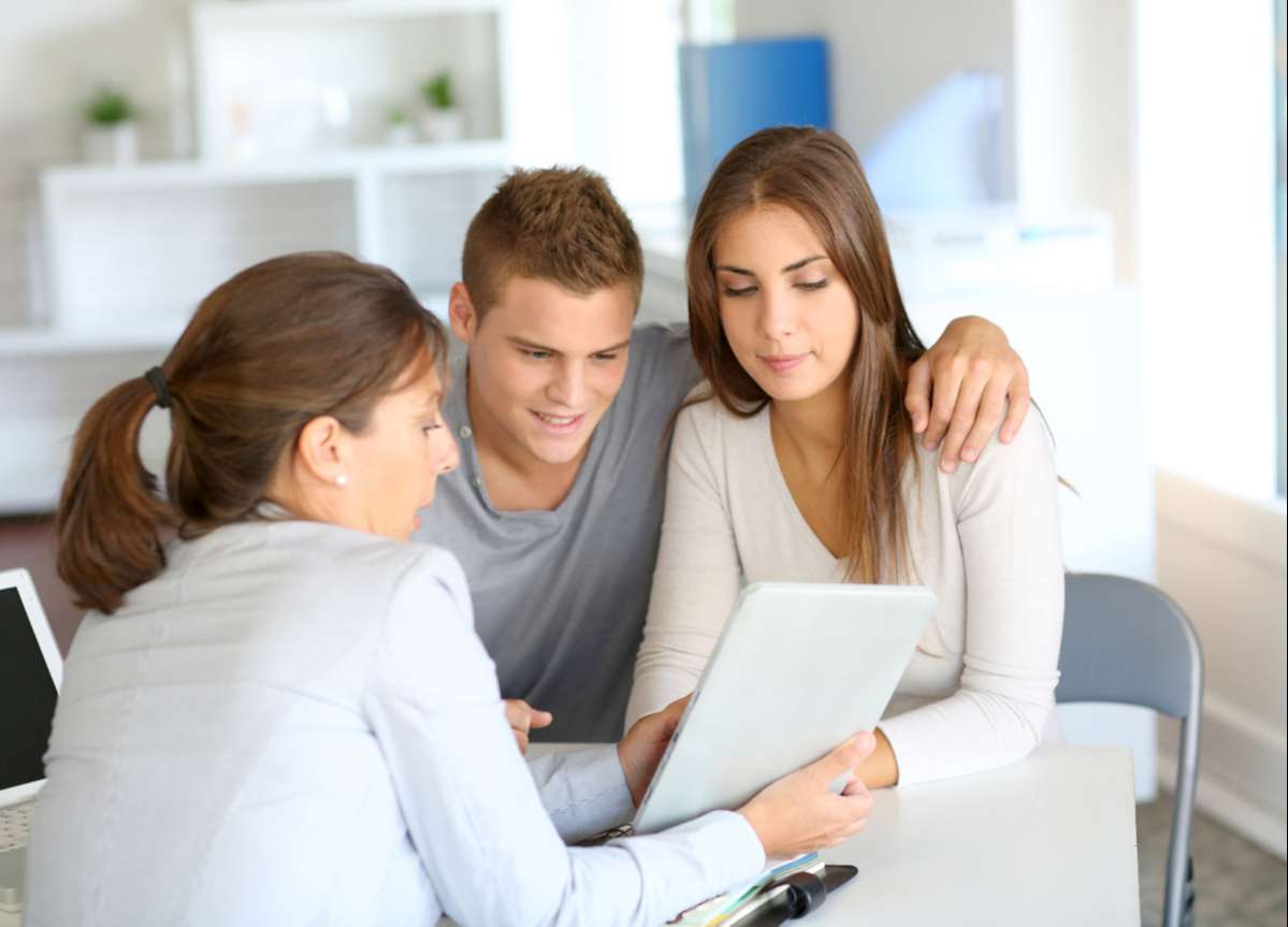 Young couple meeting financial consultant for credit loan (R) (S)
