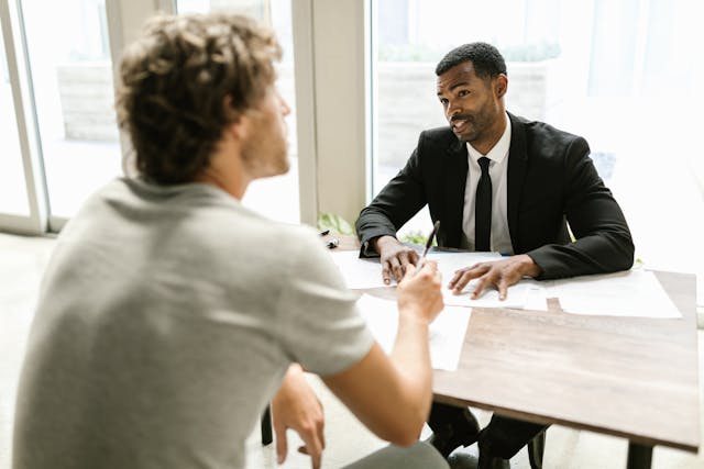 property manager and client in office